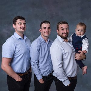 family portrait - 3 brothers and young boy